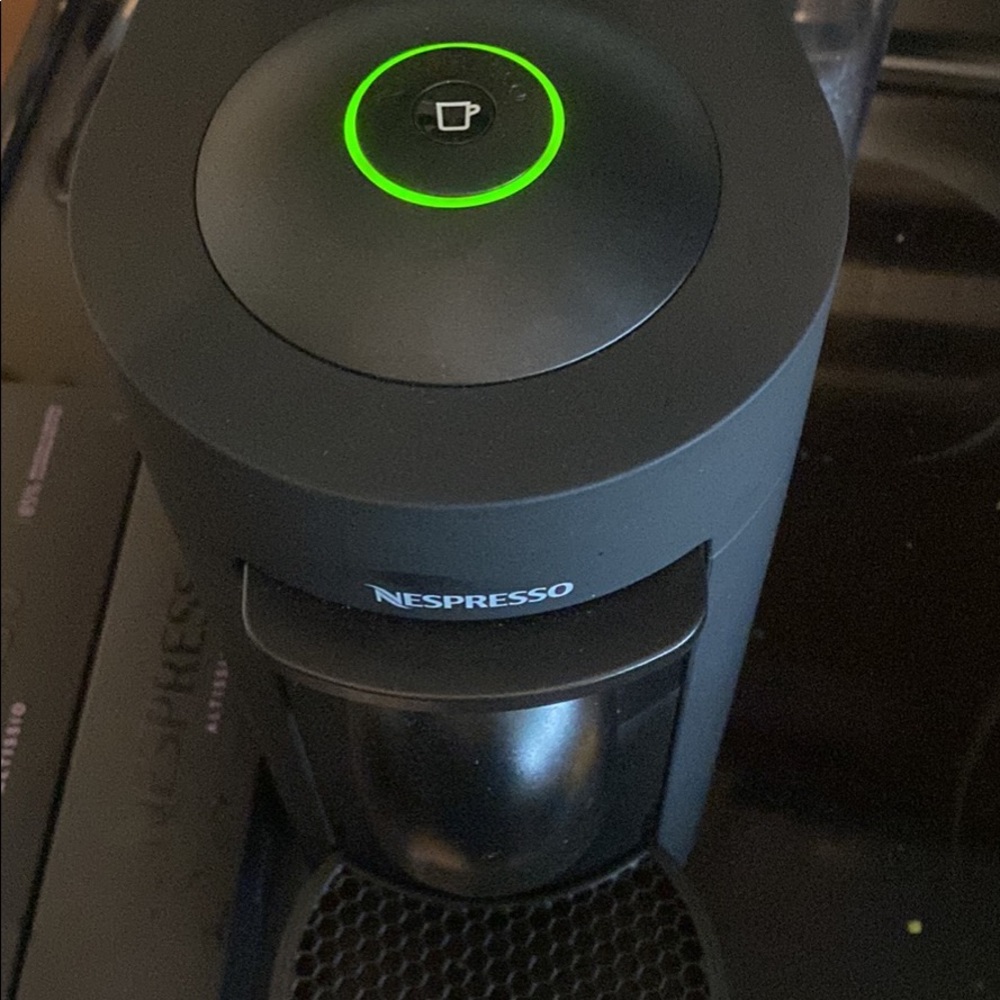 Nespresso DeLonghi machine with capsules included
